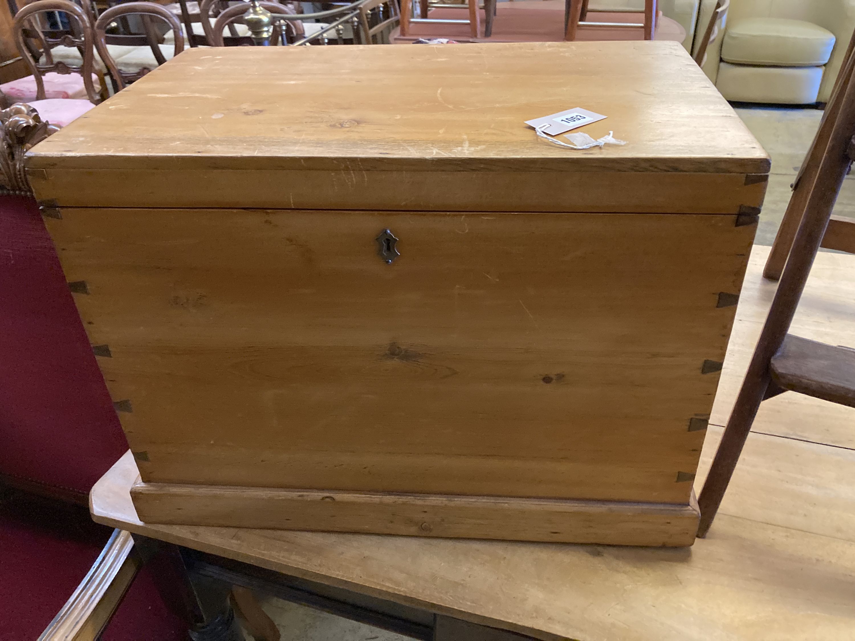 A pine chest with hinged top, width 63cm, depth 40cm, height 44cm together with a folding two-step stool